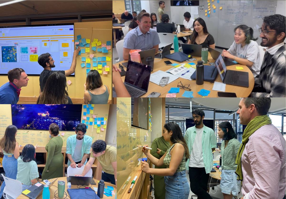 The team working through findings with sticky notes and whiteboards, alongside a mentor.